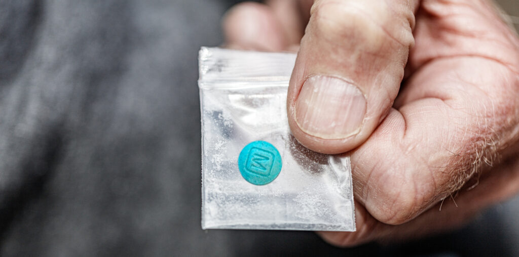 blue fentanyl pill in plastic bag